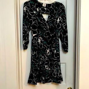 Cabi forest green dress with cutout back. Gently worn.
